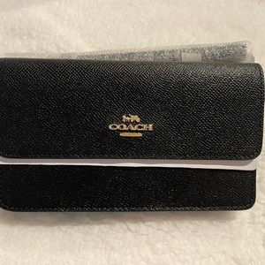 Coach fold over wristlet
